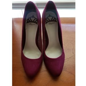Maroon colored high heels